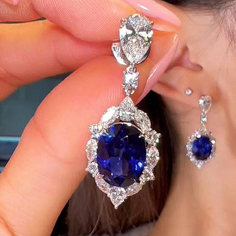 Vintage Halo Oval Cut Blue Sapphire Women's Earrings In Sterling Silver